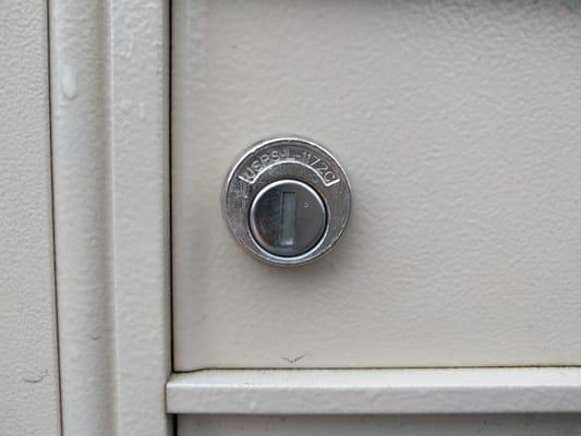 Old mailbox lock unusable since the key was lost in the house foreclosure.