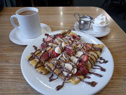 Crepes with strawberry banana and nutella.