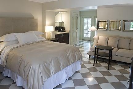 Opaline, a ground floor room, showing French Doors leading to an outside porch and Inn grounds