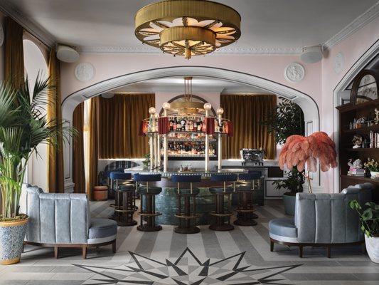 Savor the sophistication with the Sunset Bar's cocktail menu by Bar Director Jerom Morris, featuring 1930s classics to modern explorations.