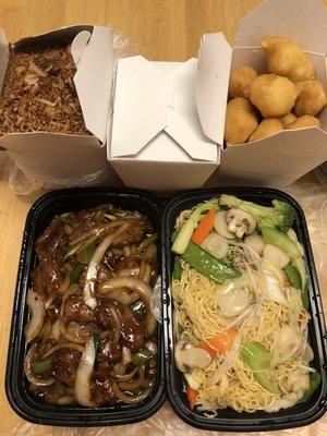 Lg Mongolian Beef next to lg veg lo mein  yum Golden fried rice, white in the middle and sweet and sour chicken.