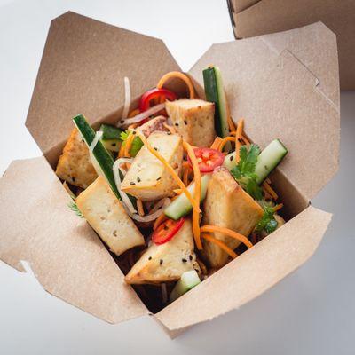 Tofu salad w/marinated, baked tofu, pickled carrot & daikon, fresno chiles, cucumber, cilantro, black sesame seeds. Available by the 1/2 lb.