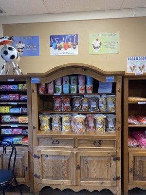 Popcorn, candy and mech! They also have a cooler for pop, candy at the register and frozen treats in the freezer!