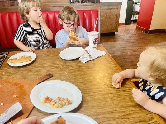 Kids eating 14" Large Pizza