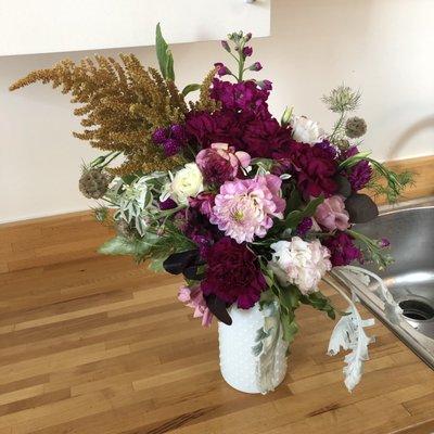 The gorgeous bouquet I built with their guidance at a flower arranging class. So much fun!