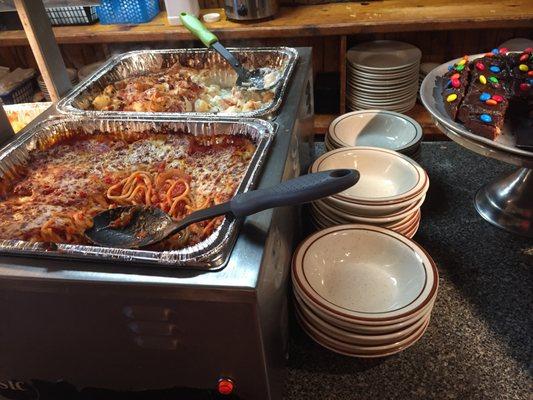 Potatos and baked spaghetti offered on the lunch buffet