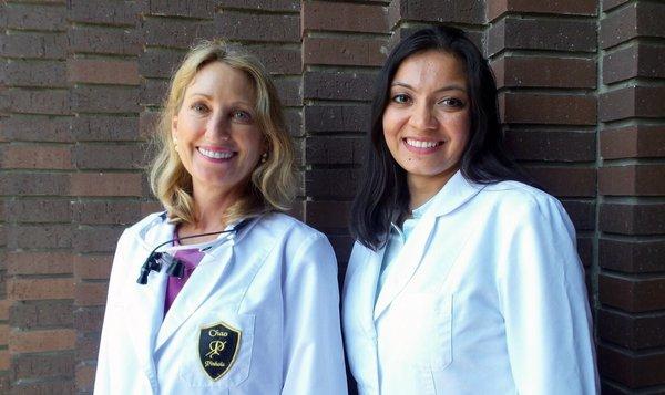 Dr. Schwartz and Dr. Patel working side by side.