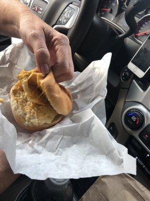 Fried egg with cheese on a hamburger bun