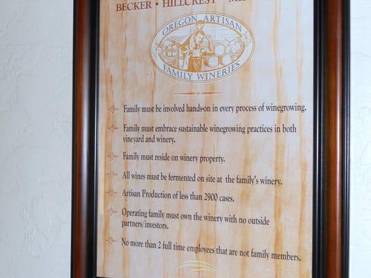 Artisan family winery sign posted in the tasting room.