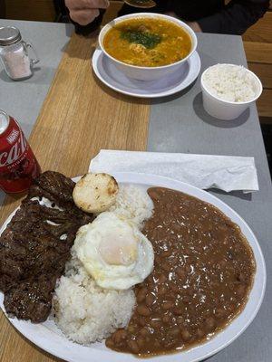 Bandeja Paisa con Carne Asada y Maduros and Sopa de Pollo con Arroz Blanco