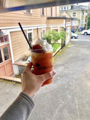 Strawberry-orange blended fruit smoothie