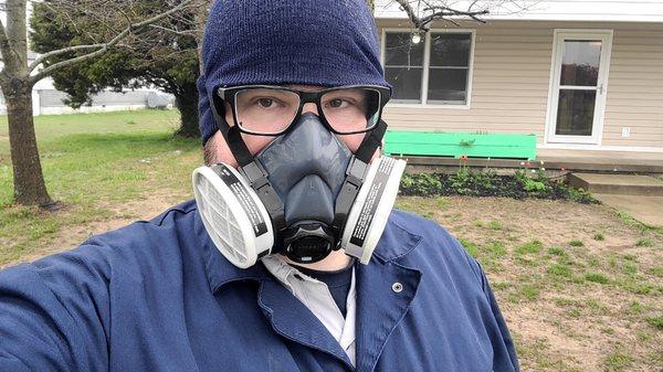 All suited up and ready to search every inch of the crawlspace.