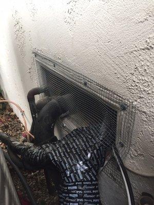 Repaired screen around Air Conditioning lines and plumbing.