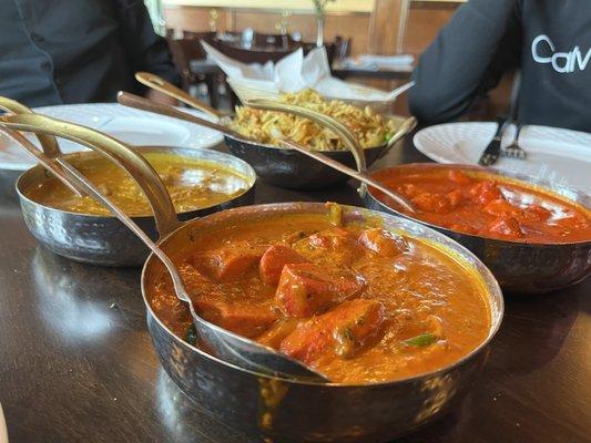 Left: Lamb Korma, middle front: Chicken Tikka Masala, right: chicken Murg Makhni, middle back: Vegetable Biryani