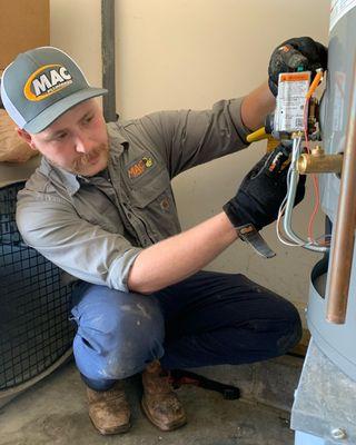 Mac can fix or replace your water heater. For expert water heater service - quack, quack, call Mac!