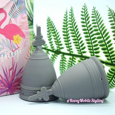 Grey color menstrual cup in sizes large and small