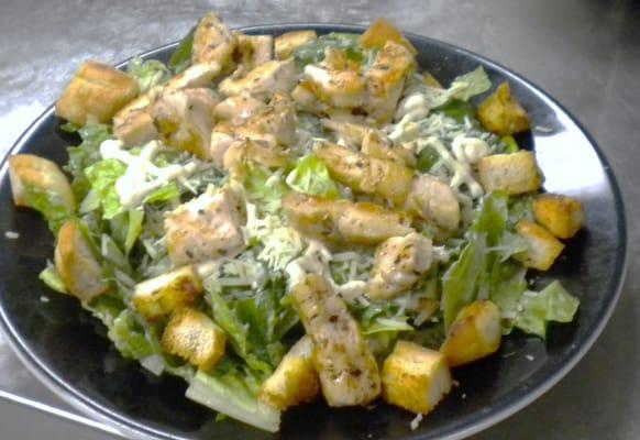 Caesar Salad with Marinated Grilled Chicken.