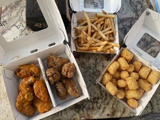 Boneless wings (two different sauces), fries, and tater tots - all to go!