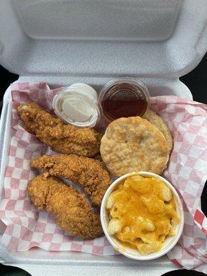 Chicken tenders, Mac and cheese, and a biscuit