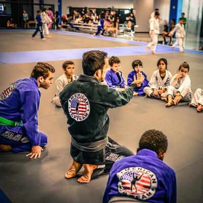 Mat chat with Master Bruninho. In addition to learning world class technique, our students learn about integrity, respect and discipline.