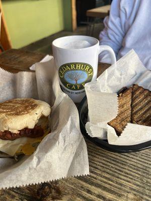 Bacon, egg & cheese on English muffin & Prosciutto, egg & cheese on whole grain harvest