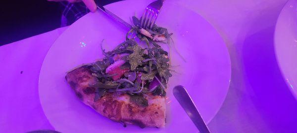 A slice of the insalata pizza