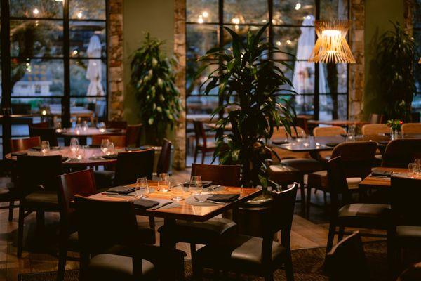 Interior- Dining tables with place settings.