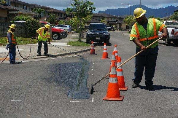 We apply sealcoating to asphalt to protect and extend the useful life of your parking lot or road.