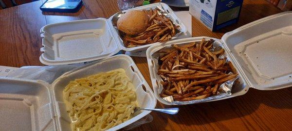 Fettuccine alfredo, plain cheeseburger with fries. Large order of fries.