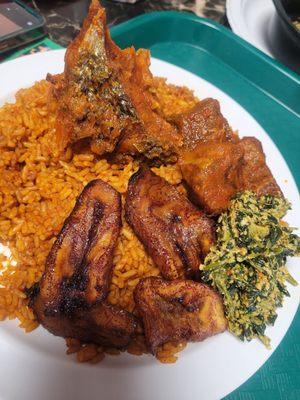 Jollof rice with fish, beef, plantain, and egusi