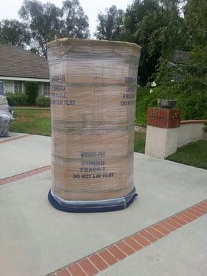 An example of how Preferred Relocation will wrap your curio cabinets and china cabinets before your long distance move.