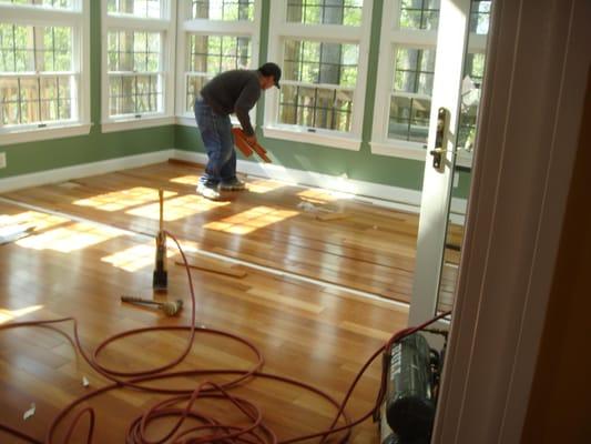 wood floor installation in progress