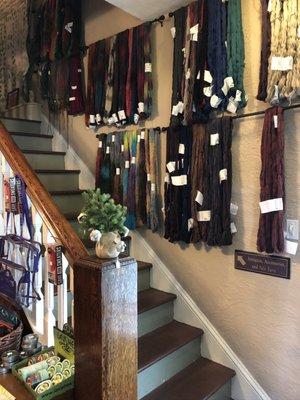 Stairs leading to knit garments and discount yarn