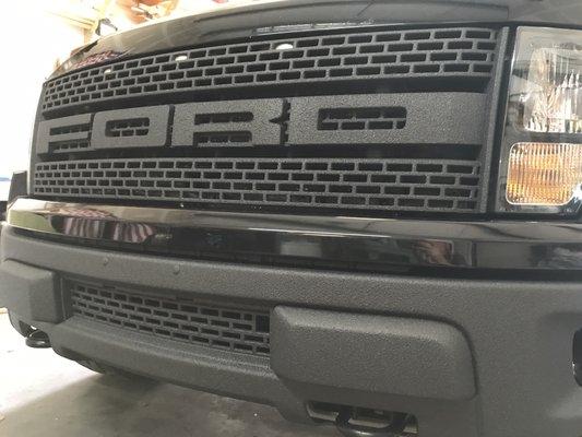 Custom titanium grey ford raptor grill and bumper