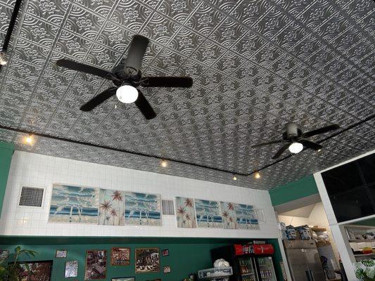 Beautiful tin ceiling and Caribbean art