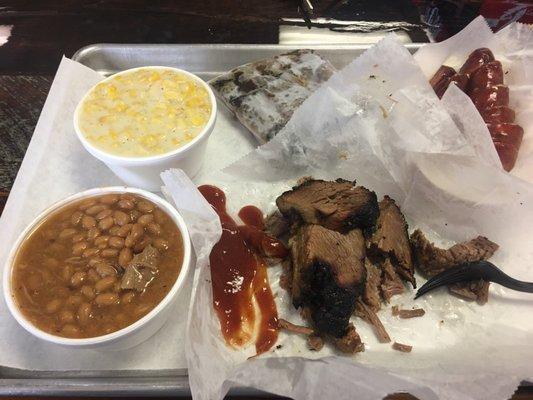 Smoked brisket... sausage... ribs... beans... cream corn... take my money!!!!