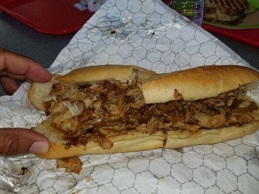 Chicken cheesesteak with onions.