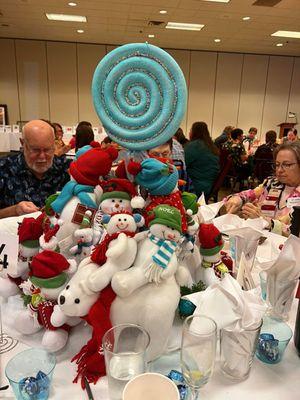 Each table is decorated in a different theme.