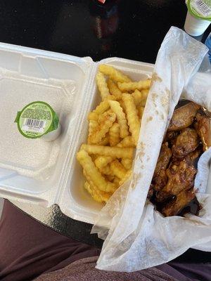 Honey bar b q wings n seasoned fries.