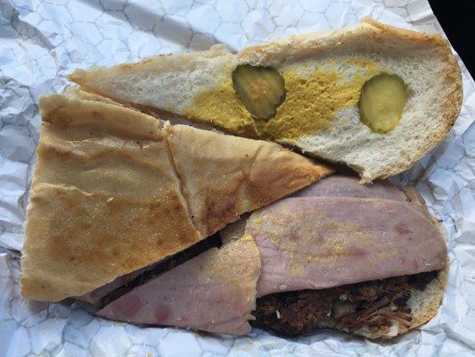 I believe those r slices of pressed ham. And where is the mustard? And a total of 3 pickle... see next pic for that 1 other pickle