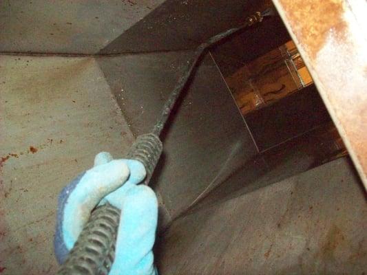 When We Can't Get In the Duct We clean it the with a power washer with heating coils in this pic we are using a gun!