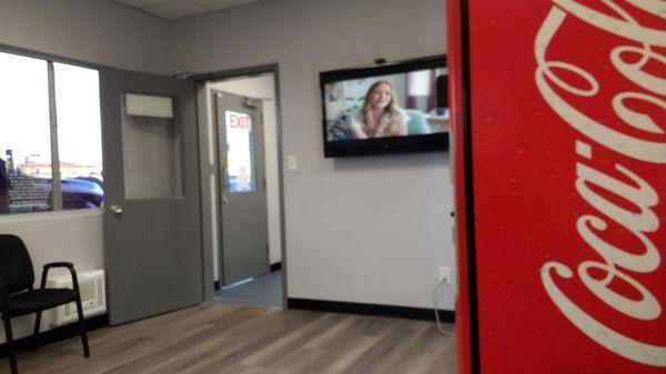 Waiting room. Vending machine of refreshments and cable television.