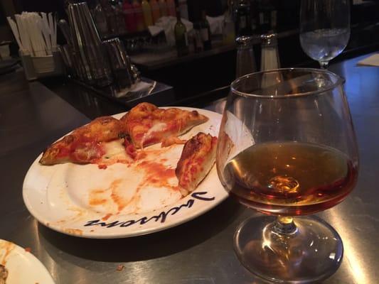 Courvoisier and a Margarita pizza with pepperoni.