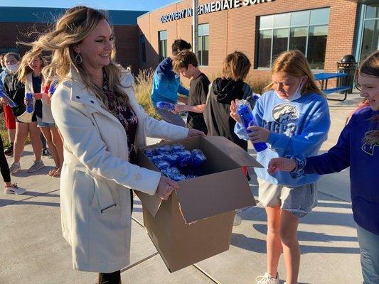 3,730 water bottles for the students and staff k-6 for USD265.  Learn about other ways we give back to our community on our website!