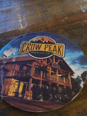 A coaster with their signage