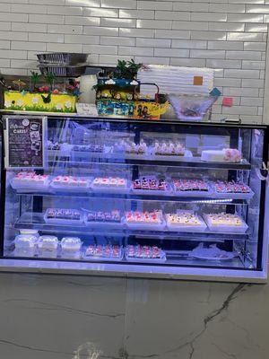 Bakery case filled with desserts