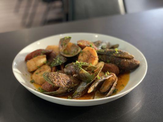 Build Your Own Platter: mussels, scallops, shausage in a Cajun garlic butter sauce.