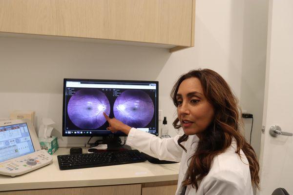 Doctor using Eye machine