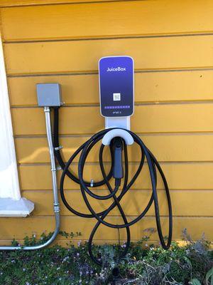 The new charger on the side our our house, next to our driveway.