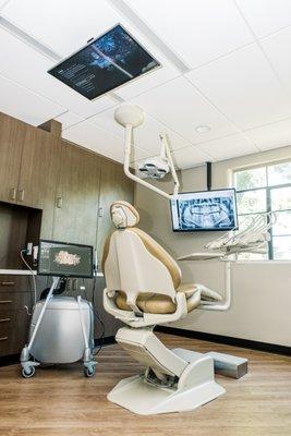 Televisions over every treatment chair